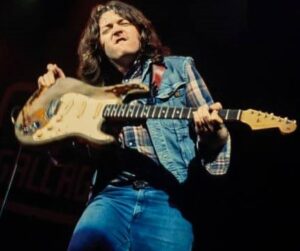rory gallagher in concert pic