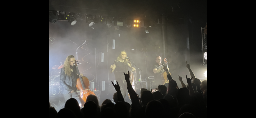 Apocalyptica on stage with black and white lighting