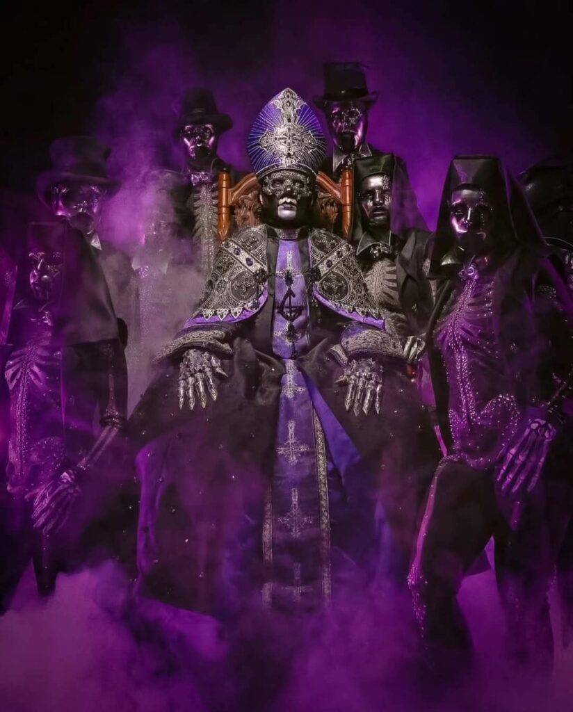 Nameless Ghouls stand around a sitting Papa V with a purple fog